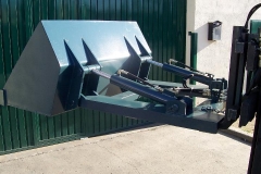 Cuchara hidraulica con fundas, para el movimiento de materiales a granel