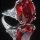 anillo de compromiso con rubí de 12 ktes y dos diamantes talla triangulo