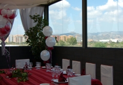 Presidencia en el salon la plana con globos
