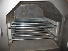 Horno de lea, compartimento superior para cocinar alimentos.