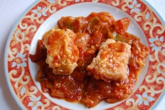 Bacalao con tomate y pimiento