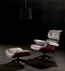 Butaca de diseno con ottoman ea, piel blanca