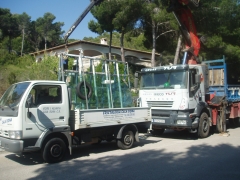 Instalacion con grua cerramiento porche terraza
