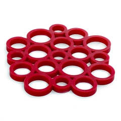 Salvamanteles silicona circulos rojo en lallimona.com