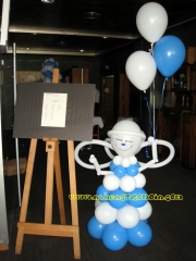 Angelito con globos de helio