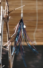 Pendientes de plata y plumas
