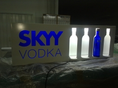 Expositor botellero skyy vodka relaizado en composite recortado laser.