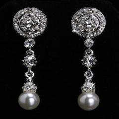Pendientes de diamantes y perlas largos