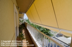 Toldo estor brazo fijo barandilla