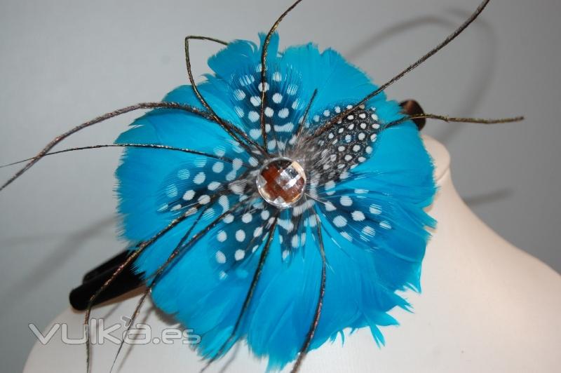 Diadema de plumas a 3.95 EUR