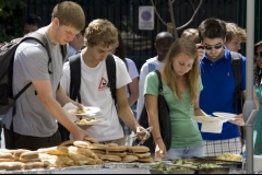 Students enjoy hamburgers and hot dogs at the annual bbq and activities fair.