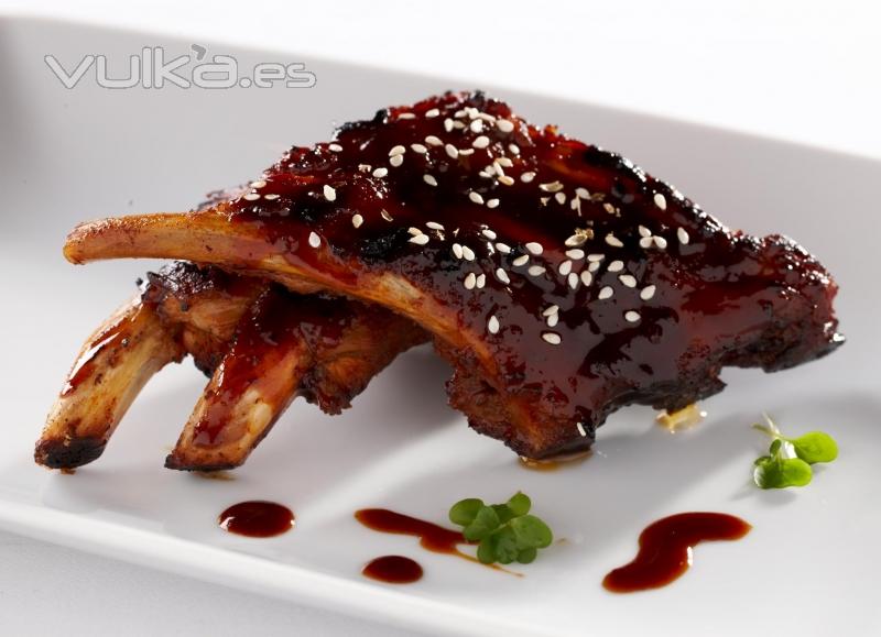 Slow Roasted baby back ribs with a sweet and sour tamarind glaze. Looks amazing!