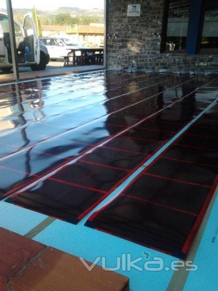 Terraza exterior calefactada con folio radiante Cecatherm