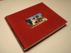 Album de 40 hojas, lomo piel con tela y porta foto.