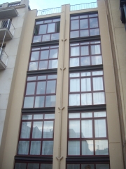 Projecte i Rehabilitació de façana amb unificació de tancaments.
