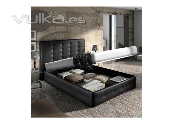 cama tapizada en negro