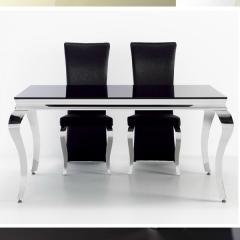 Mesa comedor en cristal y acero inoxidable