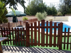 Valla de jardin hecha con palets