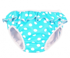 Bañador pañal para bebé y niña con estampado de lunares de la marca IMSEVIMSE