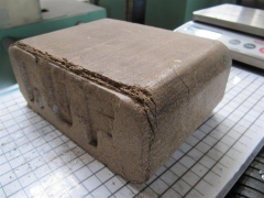 Briqueta de cascara de almendra triturada - fabricada con una ruf 200