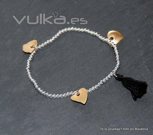 pulsera pompones y hojas doradas