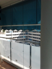 Instalacion de cortina de cristal en vivienda