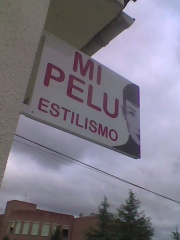 Cartel publicitario enla puerta de mi pelu
