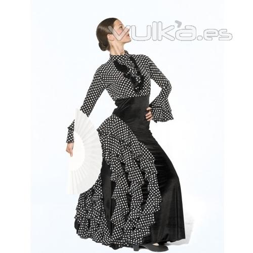 Traje de flamenco negro de lunares.