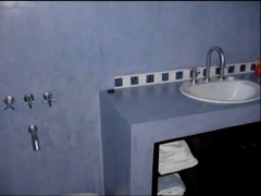 Microcemento: bao completo y detalle de lavabo