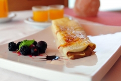 Comer en Sevilla panqueque con dulce de leche