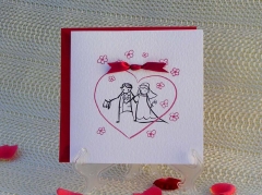 Ref 5488 - tarjetas de boda juveniles con novios y lazo rojo
