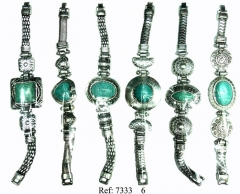 Pulsera haulita color turquesita con metal