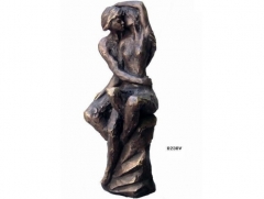 Figura pasin, con acabos en bronce. llus jord.