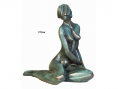 Figura desnudo, con acabos en bronce. llus jord.