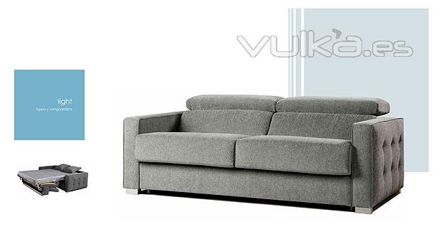 Amplio sofa cama en color gris