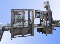 Llenadora automatica por caudalimetros y cerradora con alimentacion automatica de tapones