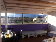 Cerramiento acristalado sin perfiles en Estepona