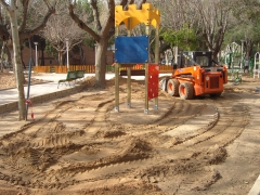 Reparto arena en parque