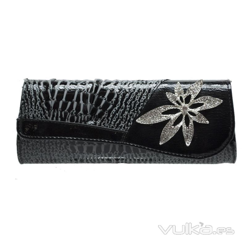 Bolso negro de mano con adorno de flor en piedras brillantes, posibilidad de colocarle asa.