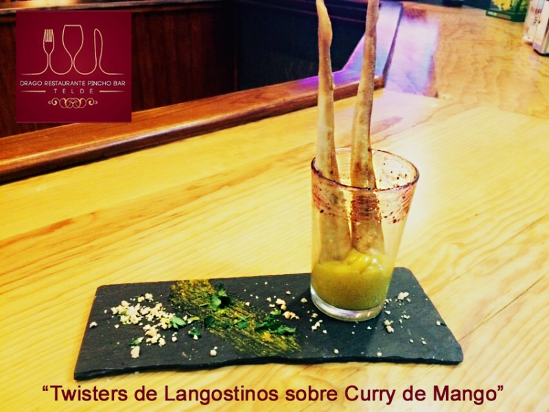 Twisters de Langostinos sobre curry de mango