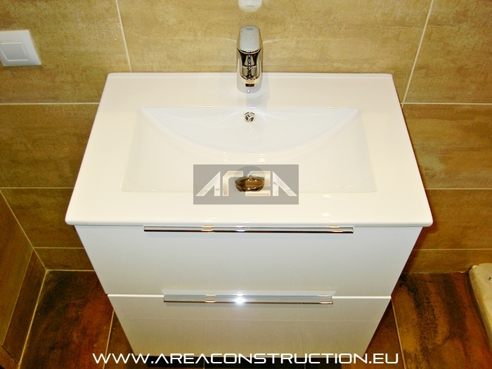 Instalacin mueble lavabo. Reforma bao Barcelona. Area Construction Technology