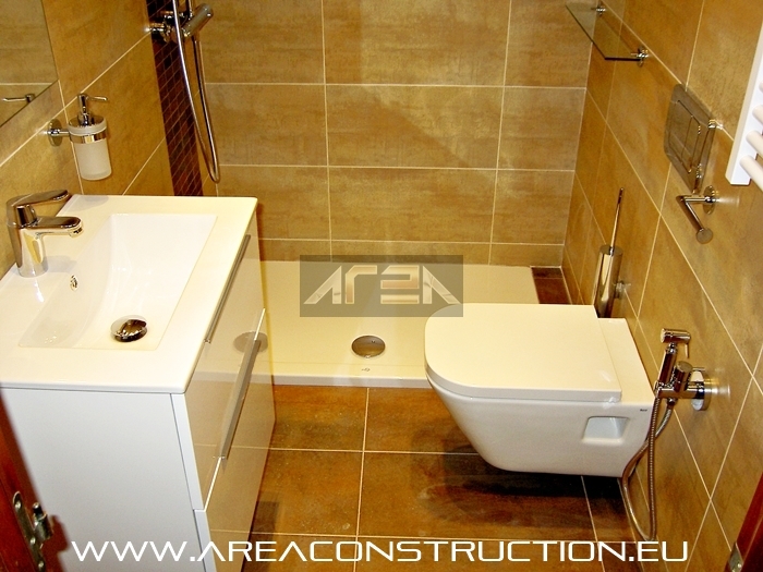 Reforma bao Barcelona. Gres Corten A de Tau, grifera Grohe. Area Construction Technology