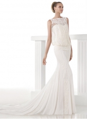 Modelo: cindy vestido de novia con corte sirena en gasa y encaje con flecos de piedras preciosas. es