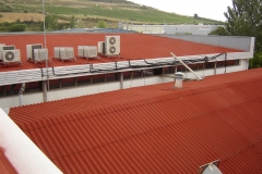 Encapsulamiento de techo de uralita en nave industrial