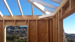 Construccin de casa de madera en entramado ligero con tejado a 4 aguas