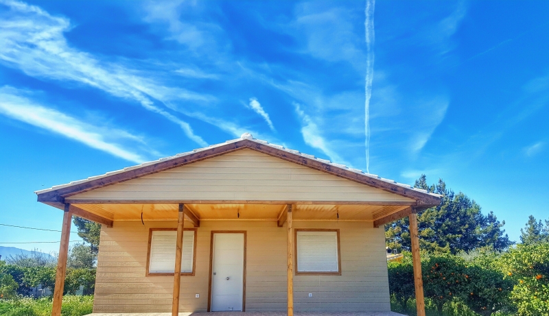 Casa de madera con terminación exterior en canexel 