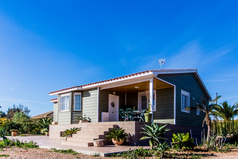 Casa de madera en canexel verde de 120 m2 ms 15 m2 de porche