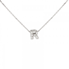 Colgante de oro de 18 quilates en forma de letra con diamante