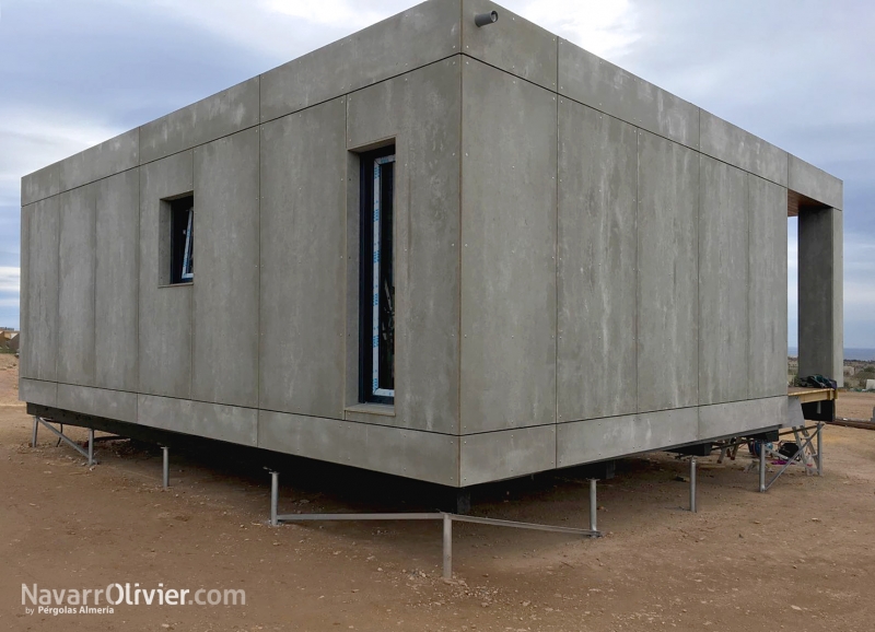 Casa eficiente de madera cde consumo casi nulo con fachada ventilada y revestimiento en Viroc