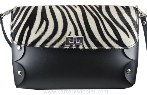 https://carterasdepiel.com/158-bolso-piel-negro-pelo-cebra.html